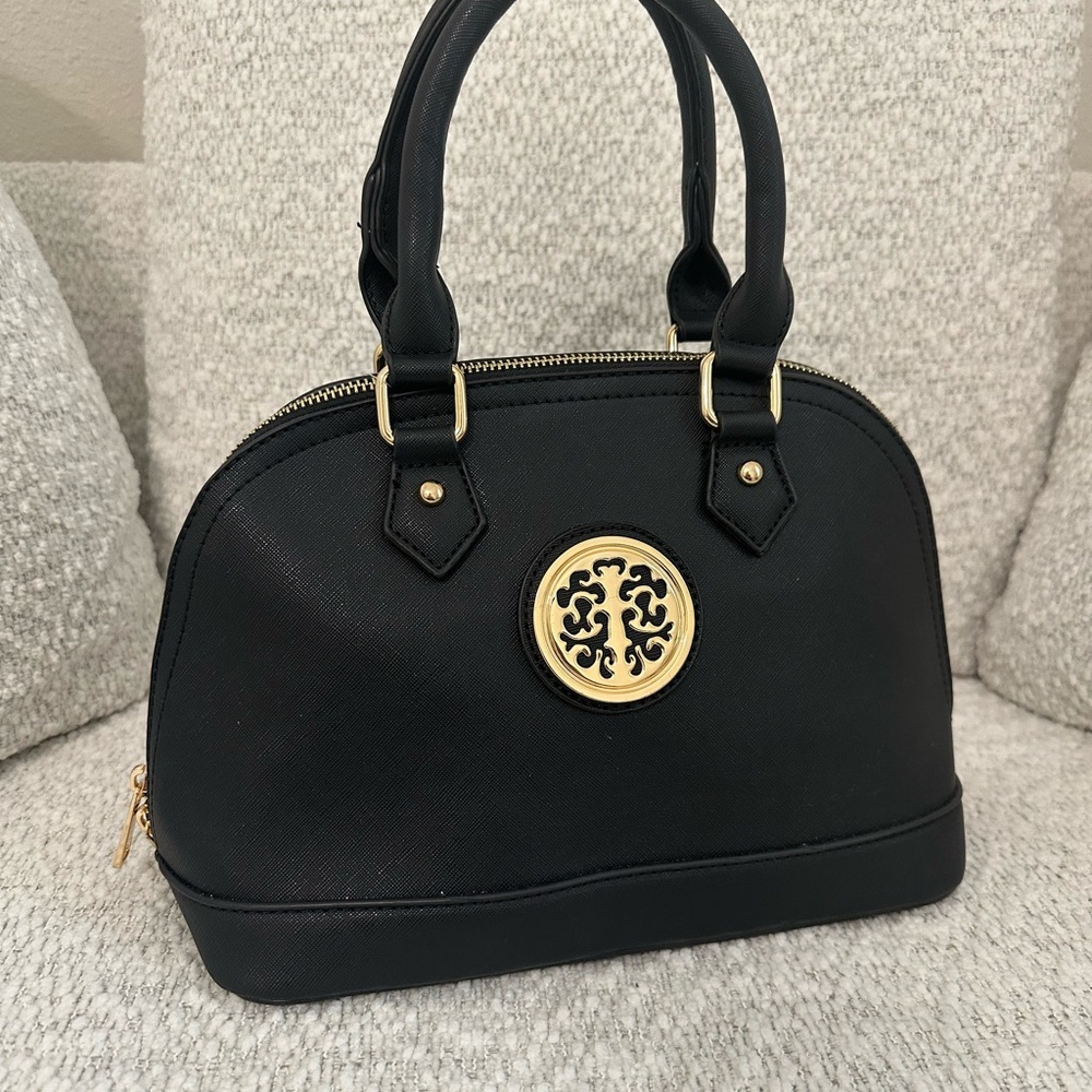 Black Designer Handbag with Gold Accents